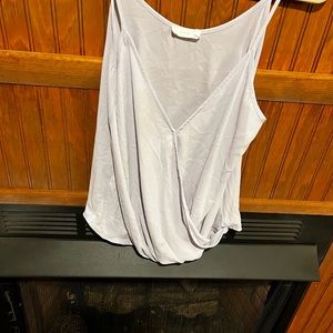LUSH summer top. Light lavender color. Drapes at bottom. Perfect condition